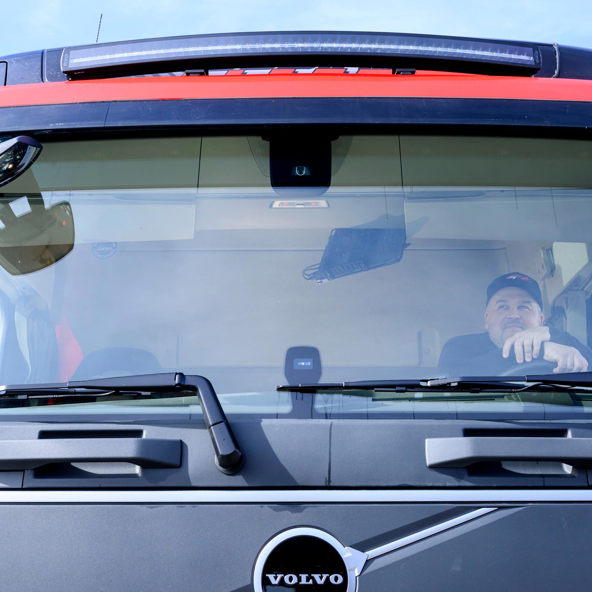 Antti Nousiainen sits in the cockpit of the biogas lorry.