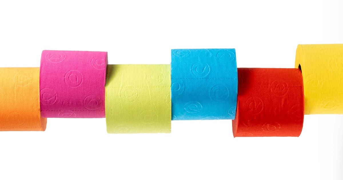 Toilet paper rolls in different bright colors