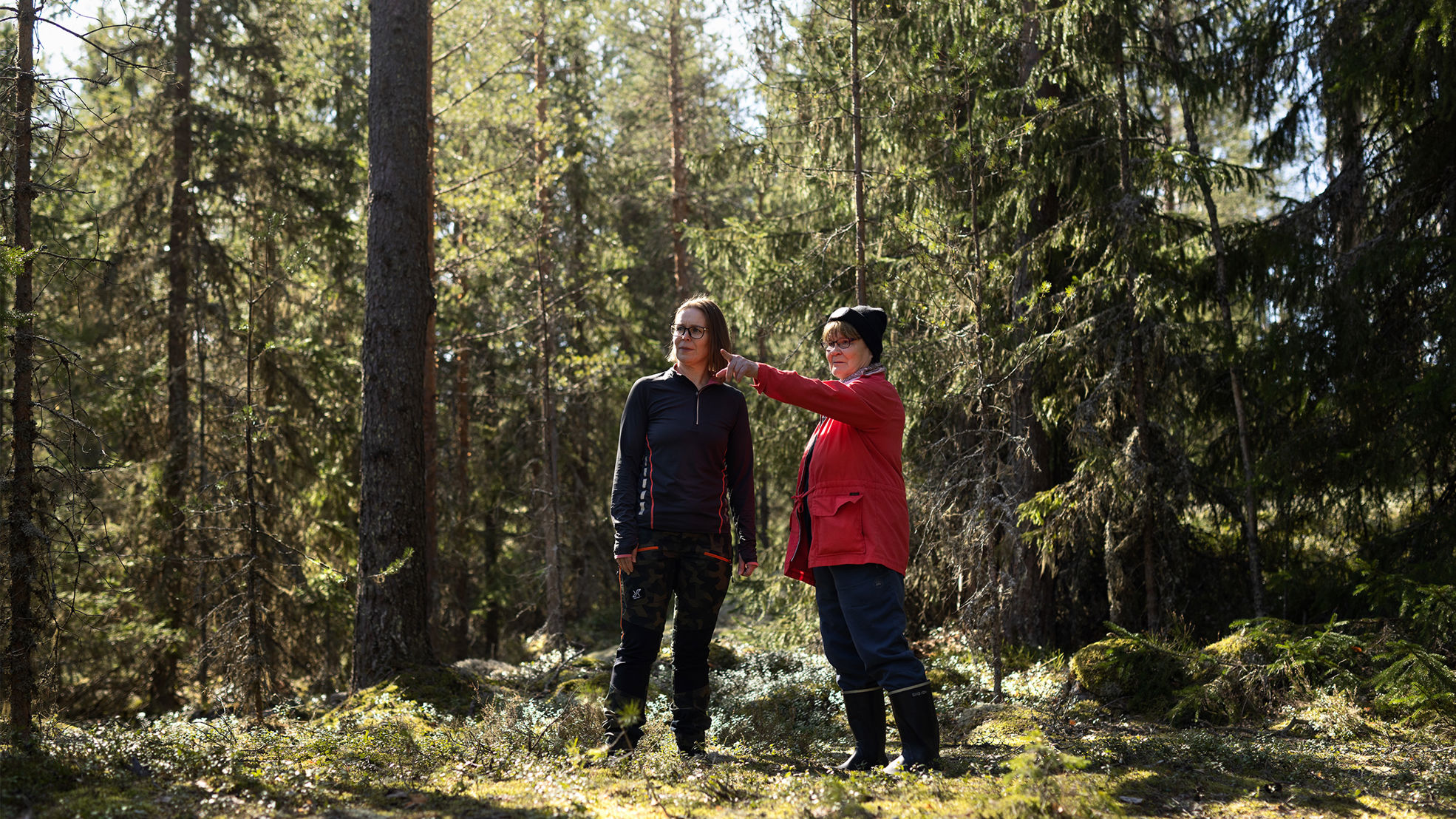 Katri Rajava and her mother in their forest