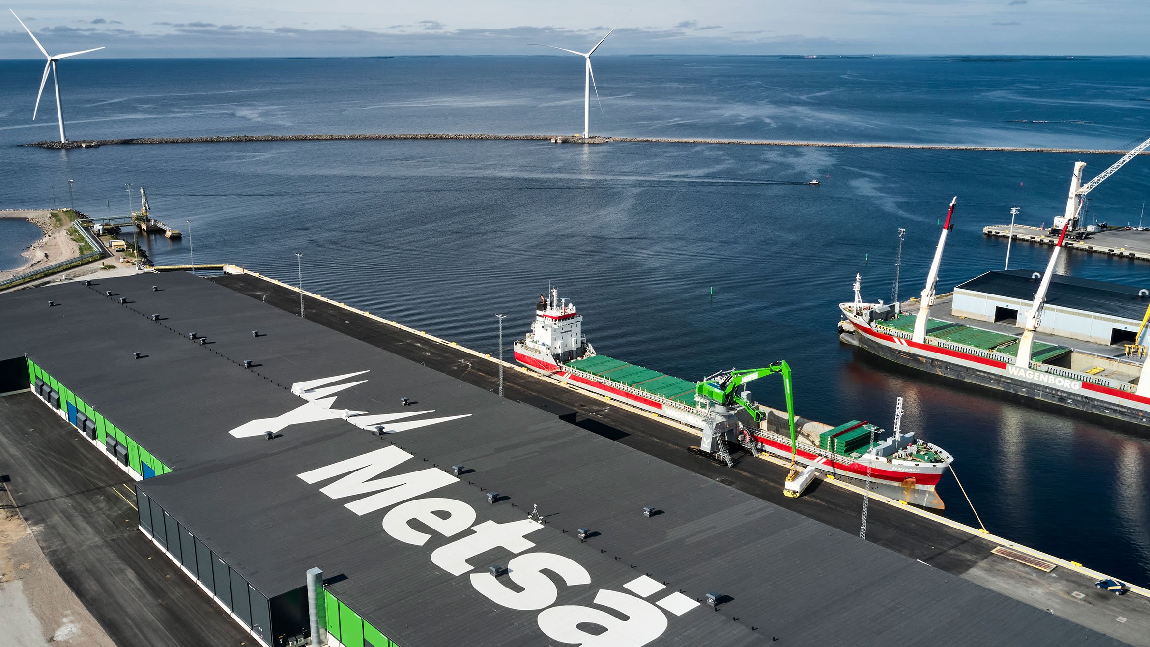 Pulp is loaded into a cargo ship from Metsä warehouse in Kemi harbour