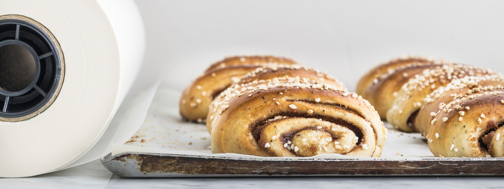 Cinnamon rolls on a baking paper